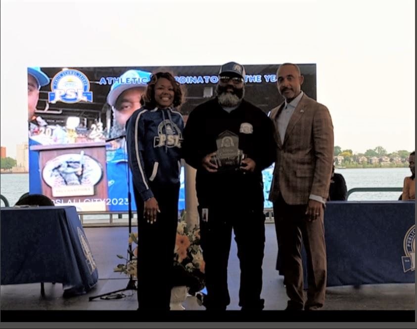  Cowans receiving an award